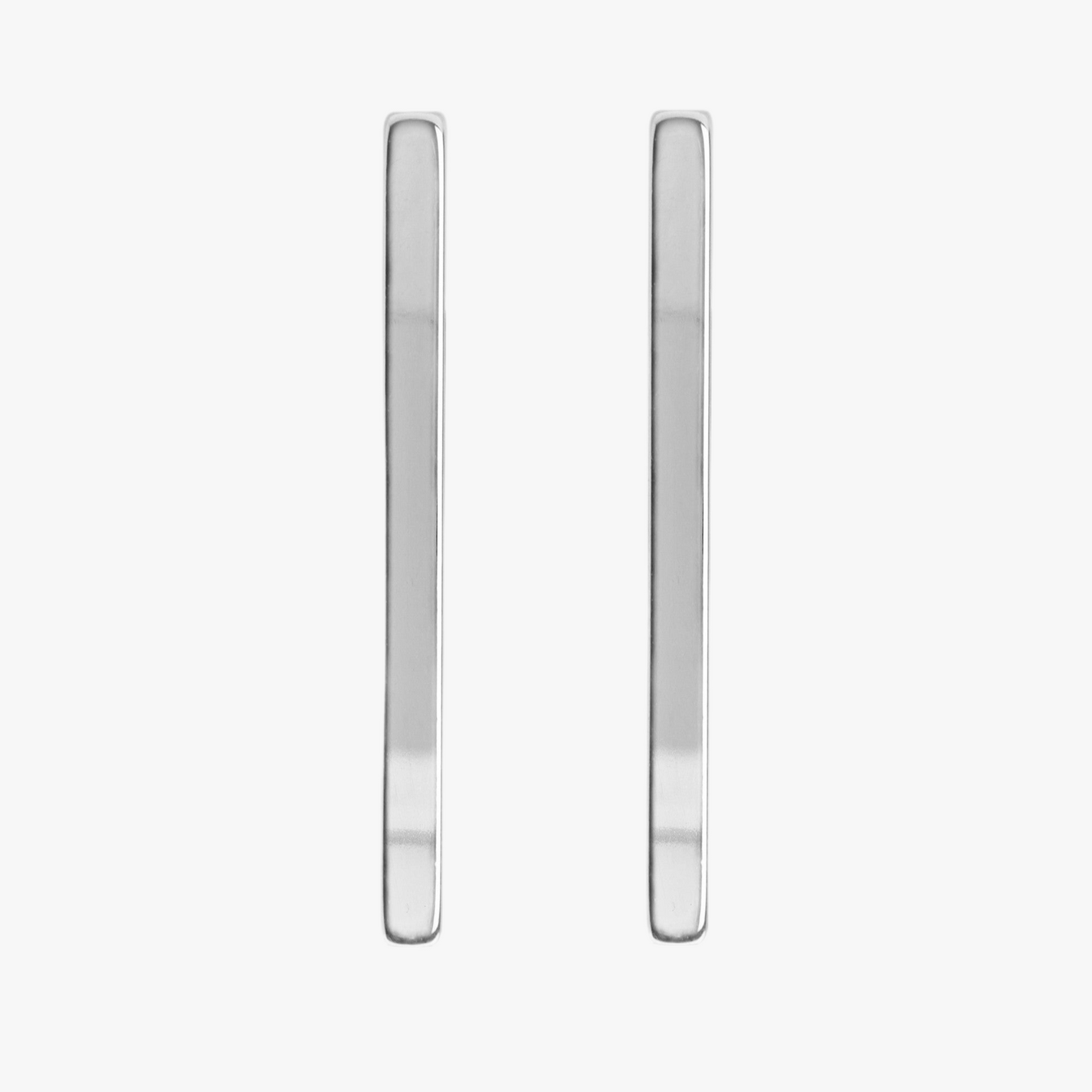 Brass stick earrings with gold finish