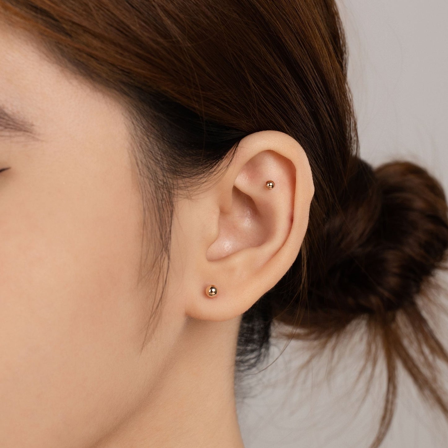 Ball Piercing in Red Gold