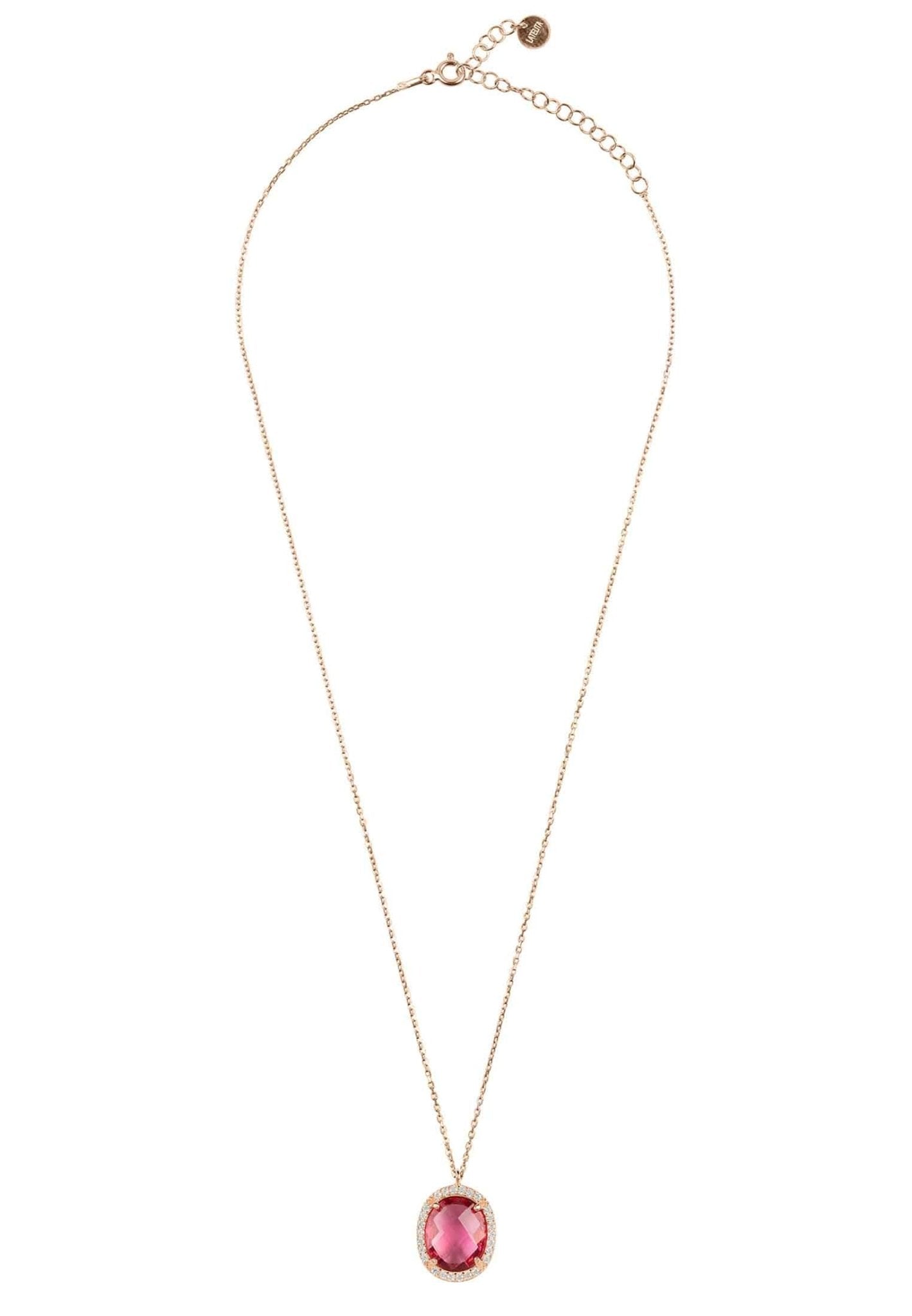 Necklace with pink gemstone pendant on white background