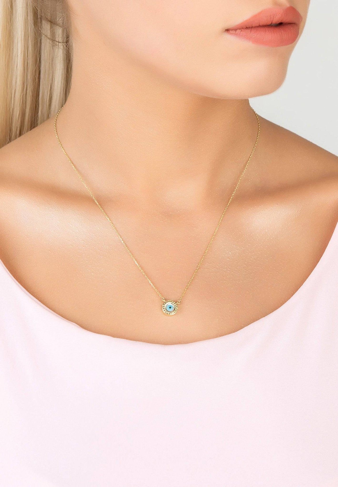 Delicate evil eye mother of pearl necklace