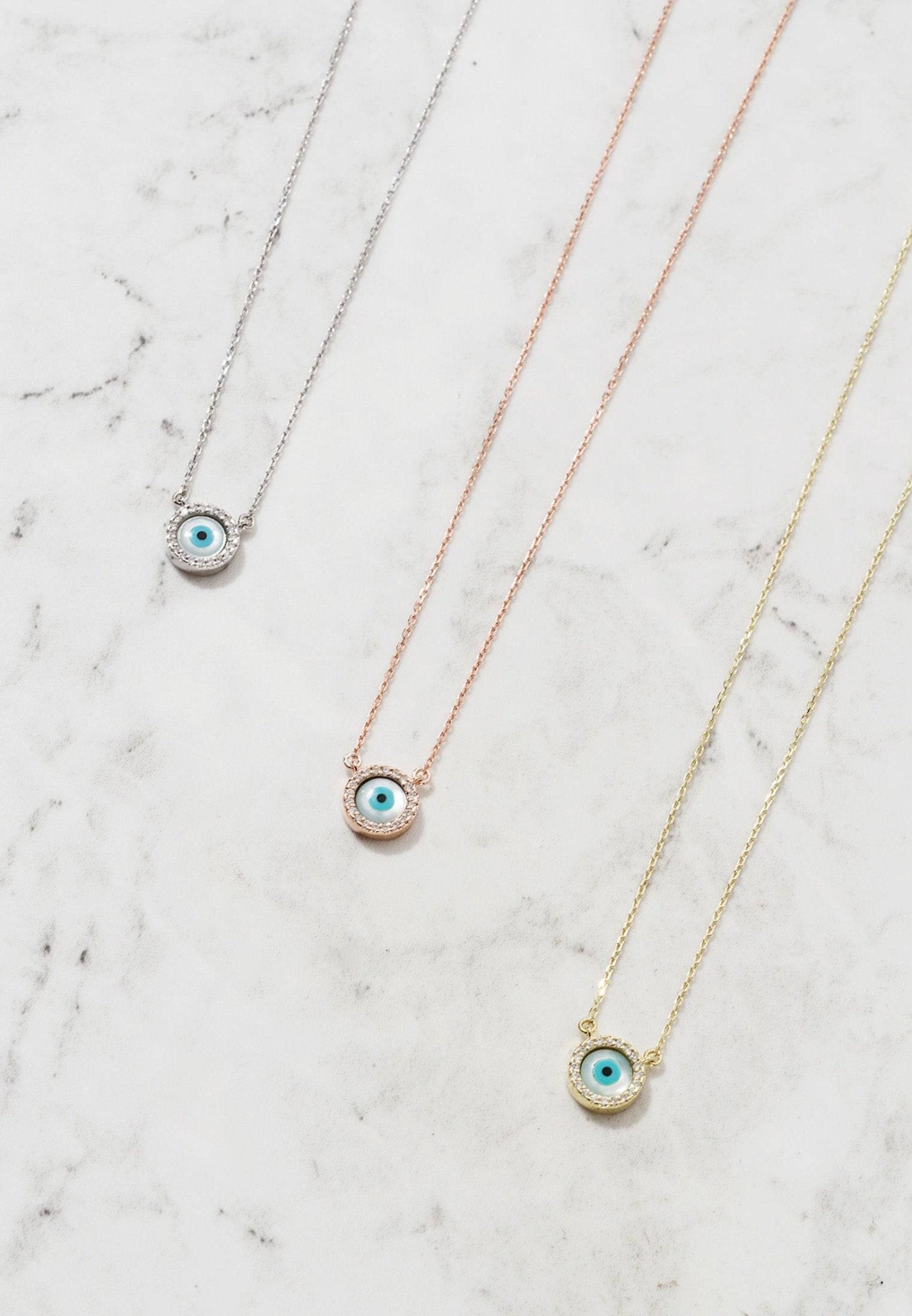 Delicate evil eye mother of pearl necklace
