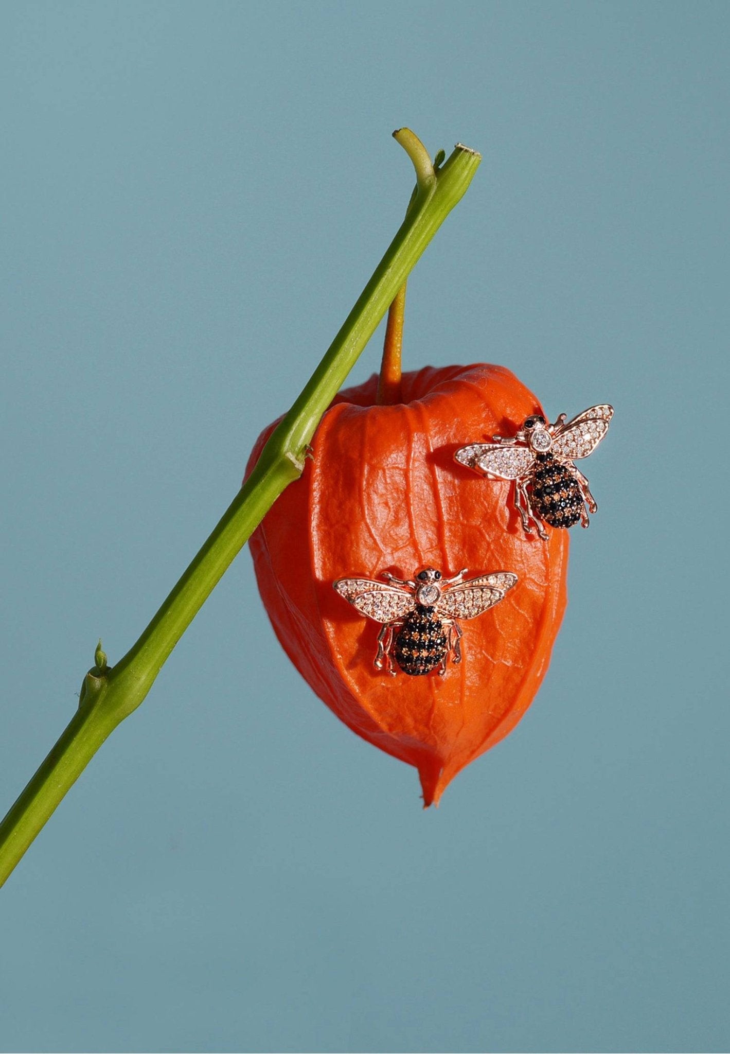 Playful rose gold honey bee studs
