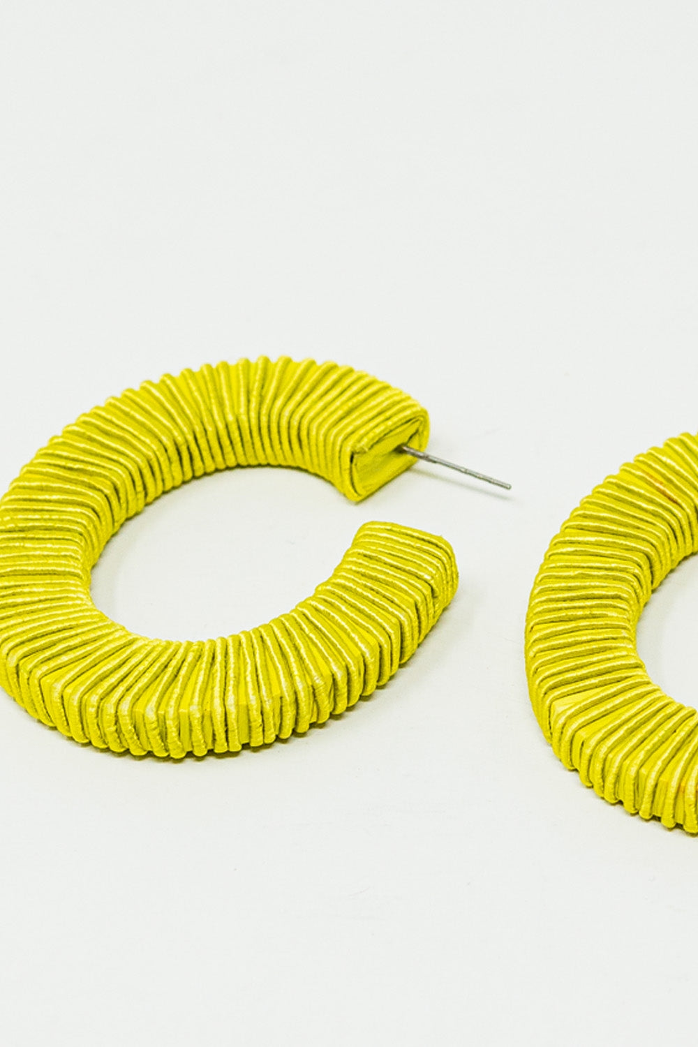 Lime hoop earrings with woven detail