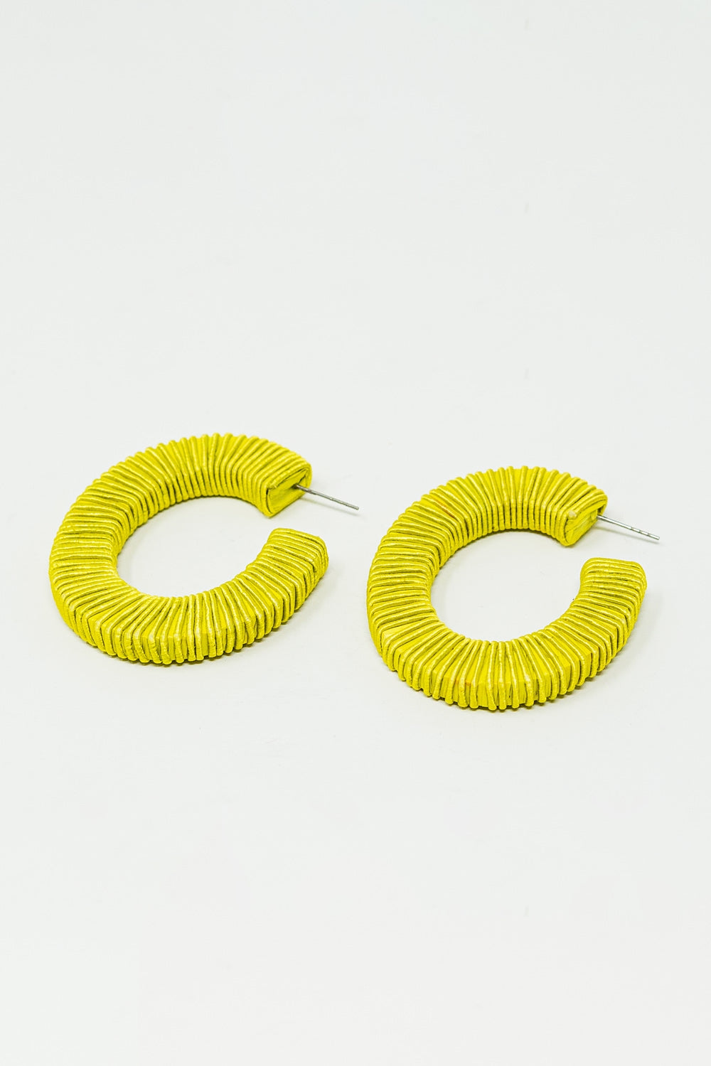 Lime hoop earrings with woven detail