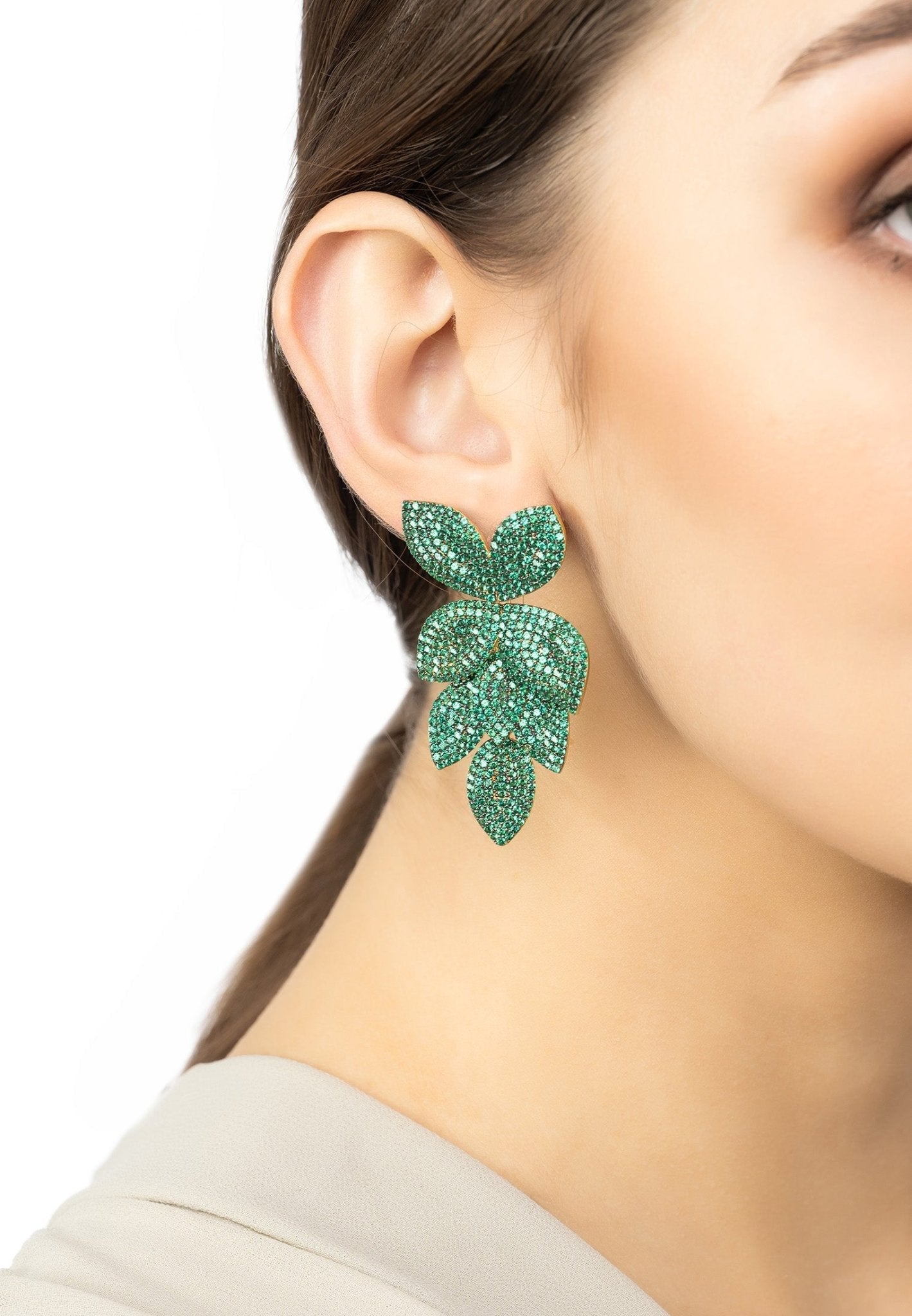 Petal cascading flower earrings gold emerald