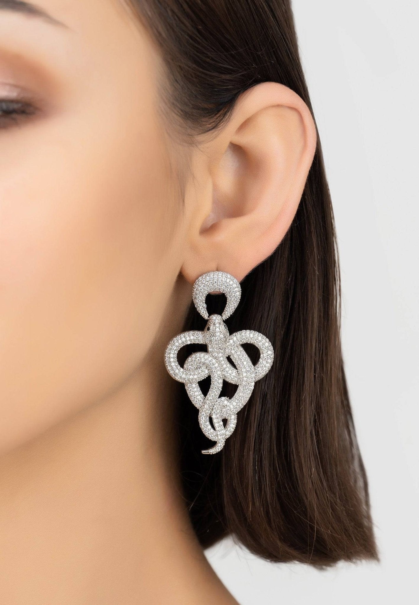 Viper snake drop earrings in silver white