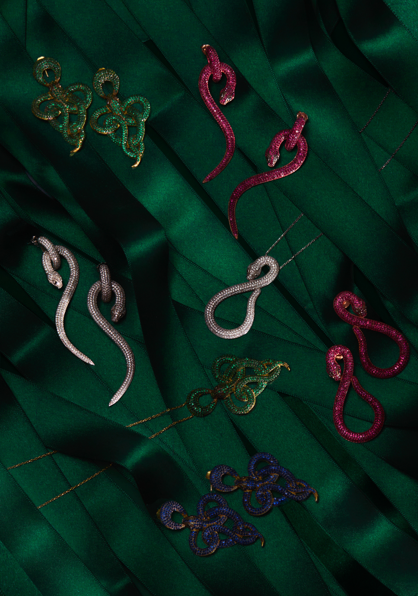 Viper snake drop earrings gold emerald