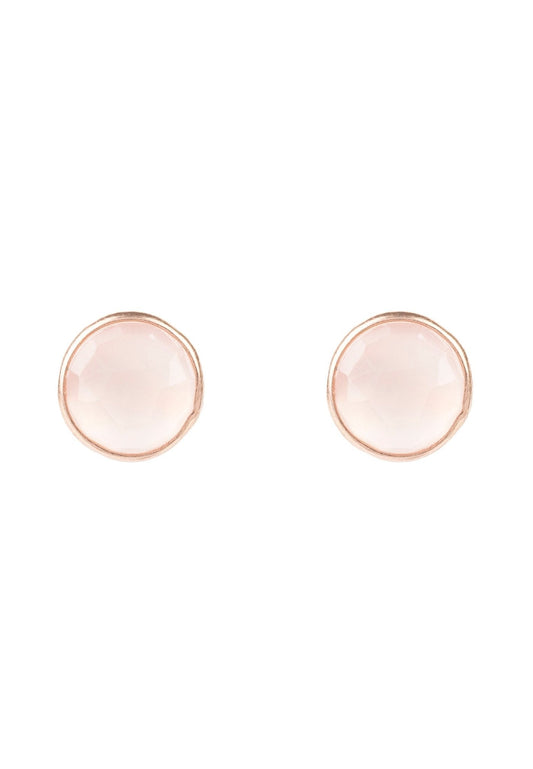 A pair of medium circle rosegold quartz earrings with a white background.